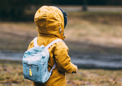 small child with backpack